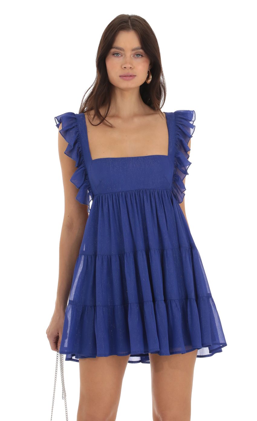 Picture Gisela Shimmer Baby Doll Ruffle Dress in Blue. Source: https://media-img.lucyinthesky.com/data/Sep23/850xAUTO/4f89d42a-831e-4c05-9fff-c1461778067c.jpg