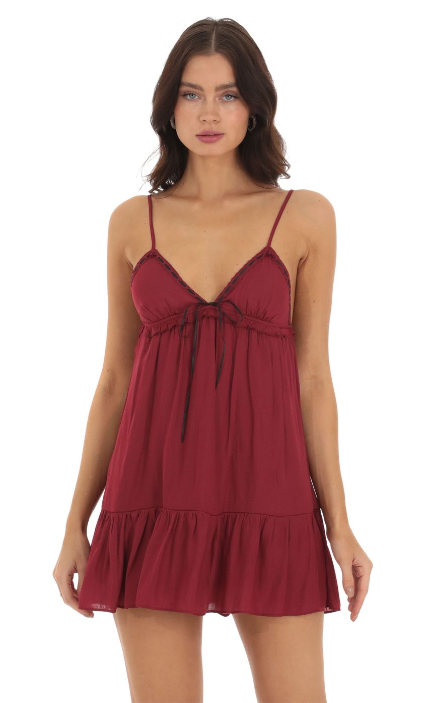Picture Front Tie Babydoll Dress in Maroon. Source: https://media-img.lucyinthesky.com/data/Sep23/850xAUTO/62bd6f4a-14fa-47a9-b5d3-768be5aad187.jpg