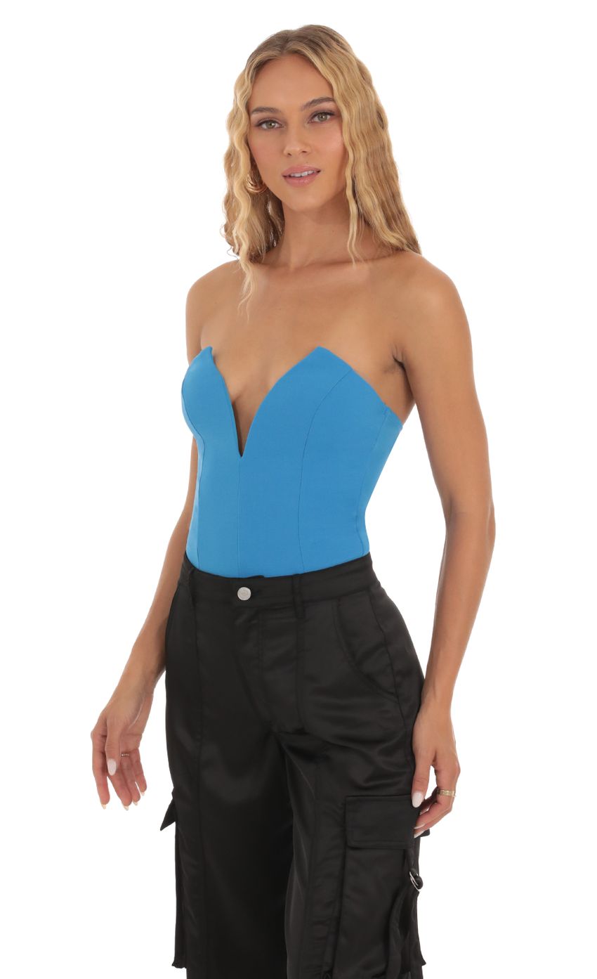 Picture V- Neck Bodysuit in Blue. Source: https://media-img.lucyinthesky.com/data/Sep23/850xAUTO/62cdf769-6566-4c4e-84d8-5dba3b100a34.jpg