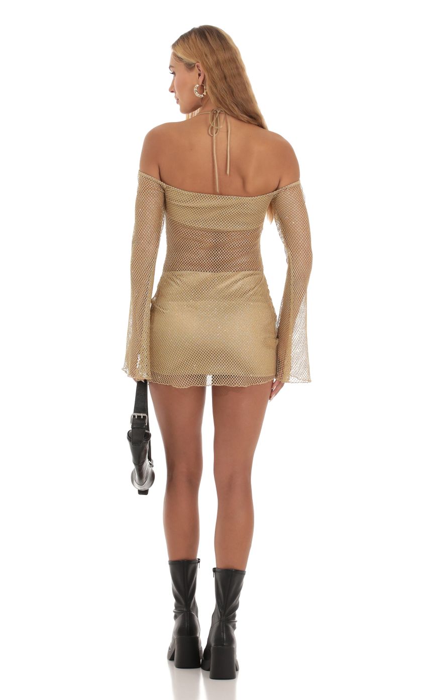 Picture Shimmer Fishnet Off Shoulder Dress in Gold. Source: https://media-img.lucyinthesky.com/data/Sep23/850xAUTO/690345bb-0495-480f-ae08-9b20e6169595.jpg