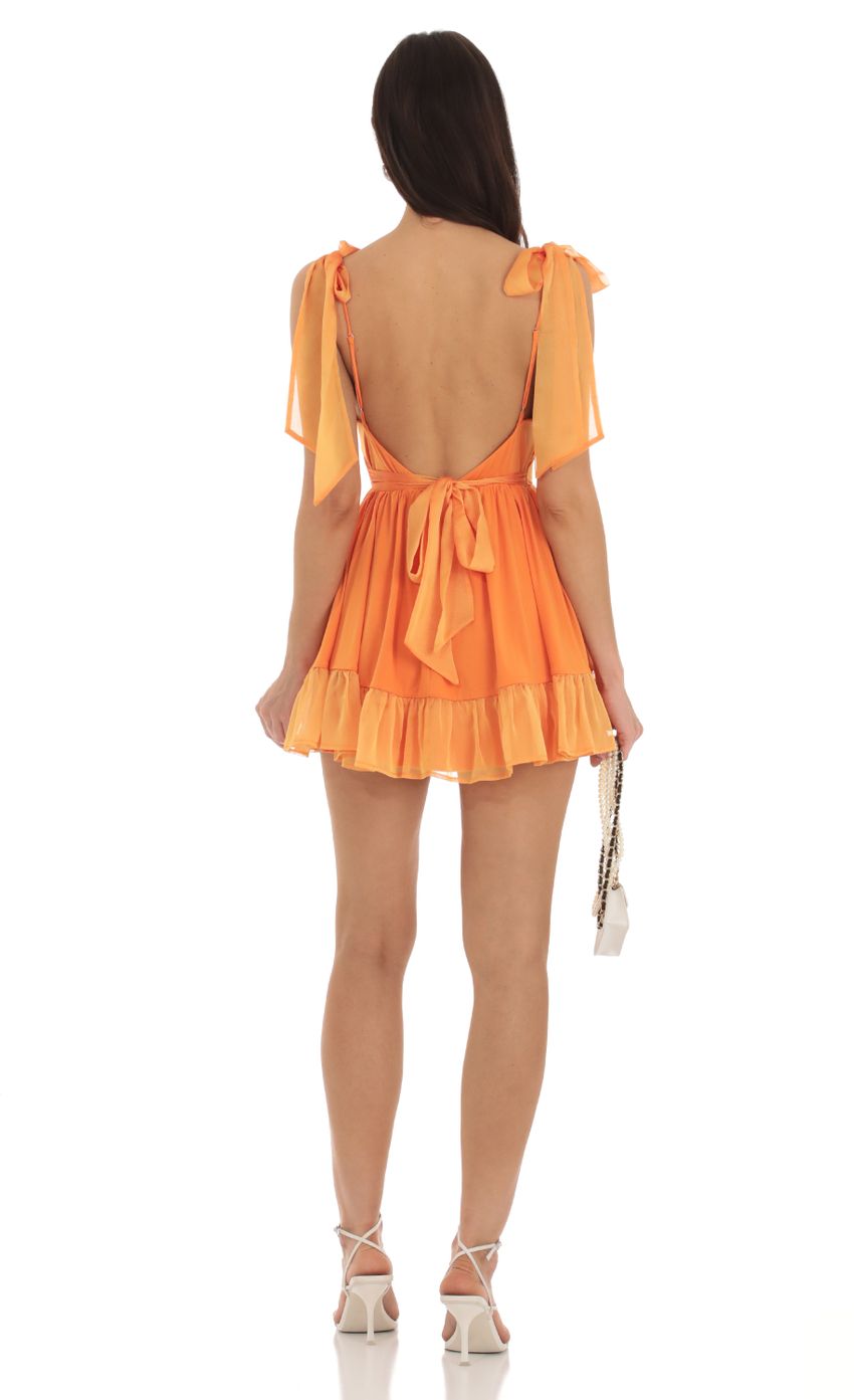 Picture Ruffle Dress in Orange. Source: https://media-img.lucyinthesky.com/data/Sep23/850xAUTO/6dfe0dd1-009e-4e93-b7e5-3823c637510d.jpg