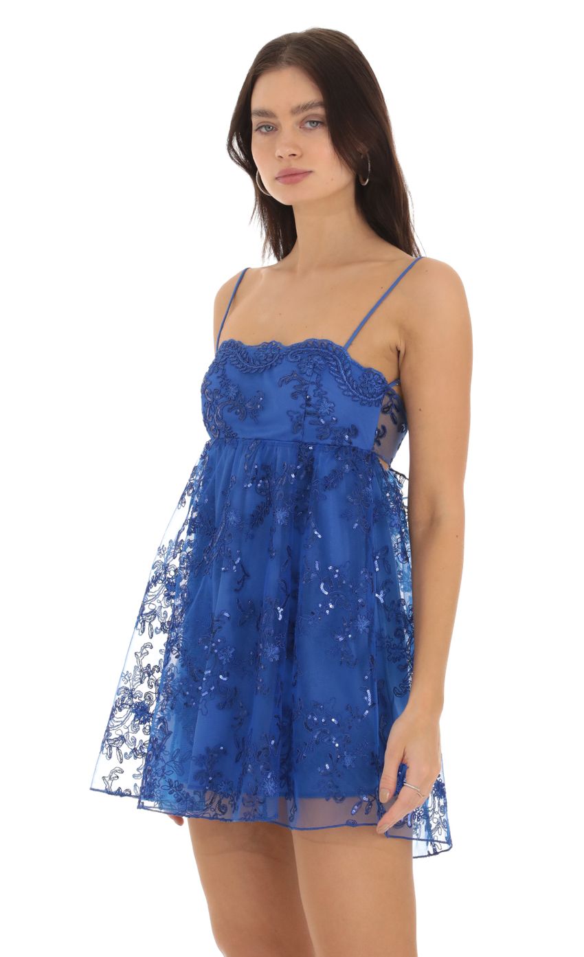 Picture Sequin Baby Doll Dress in Blue. Source: https://media-img.lucyinthesky.com/data/Sep23/850xAUTO/704a755e-6861-479a-b004-bf9ffb26738b.jpg