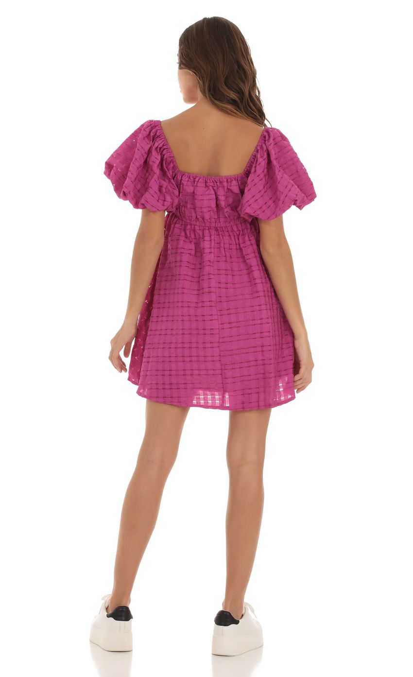 Picture Puff Sleeve Babydoll Dress in Magenta. Source: https://media-img.lucyinthesky.com/data/Sep23/850xAUTO/71cf3ec4-9a41-47ba-b1f7-853f92fef2e7.jpg