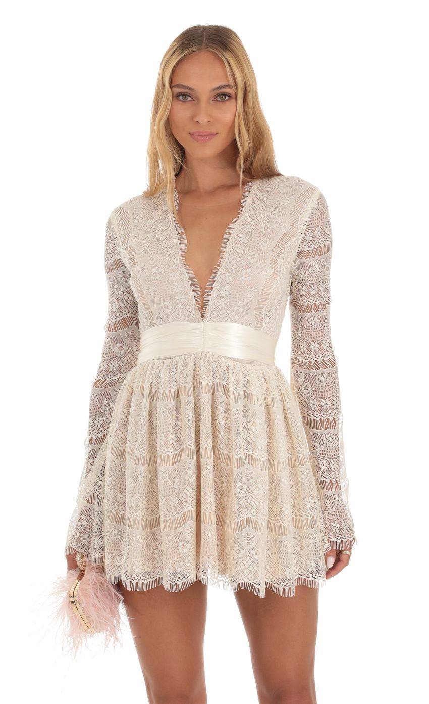 Picture Lace Plunge Neck Dress in White. Source: https://media-img.lucyinthesky.com/data/Sep23/850xAUTO/79d5fa36-9eaa-402a-b3aa-ba0aecaeeae6.jpg