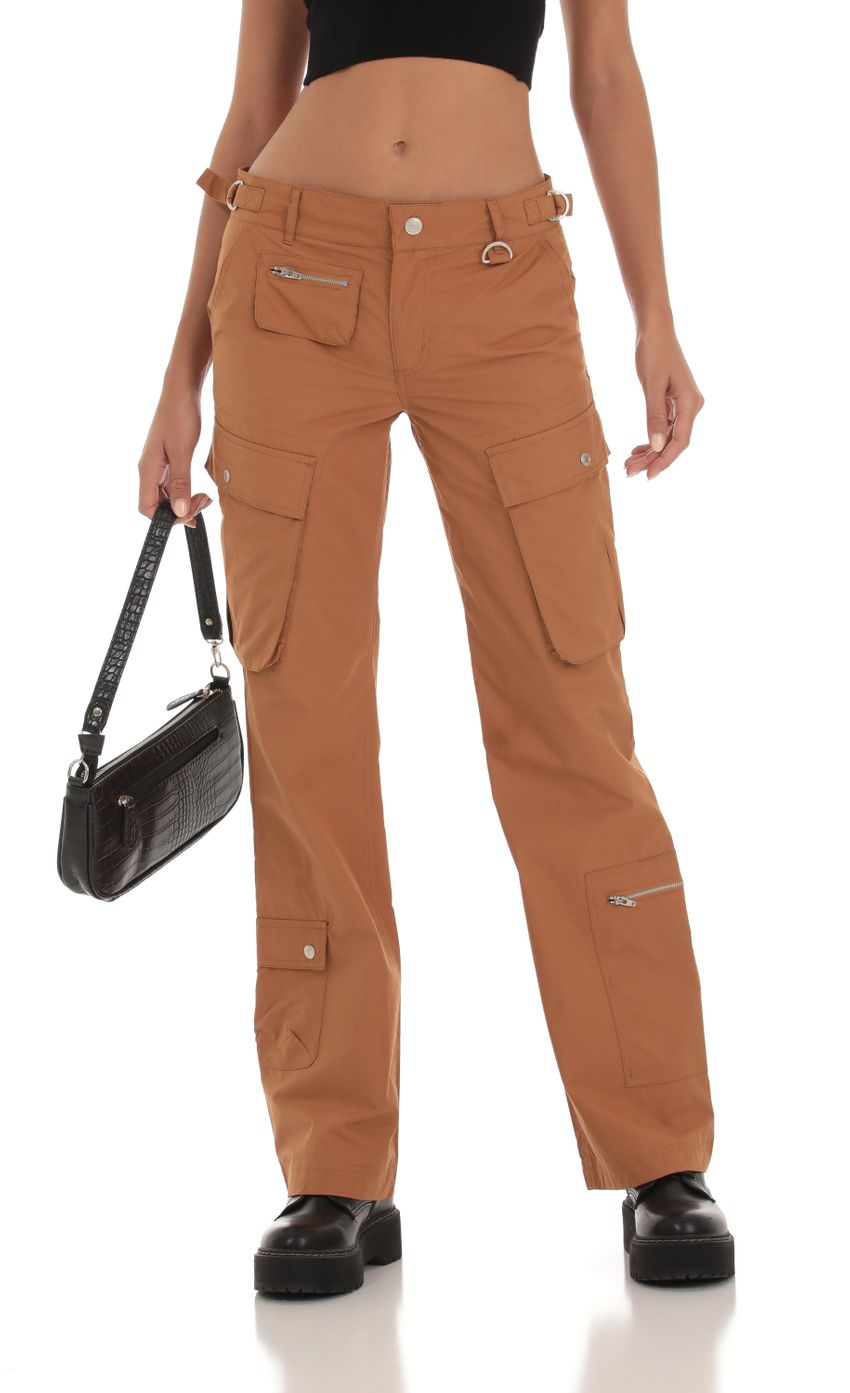 Picture Cargo Pants in Brown. Source: https://media-img.lucyinthesky.com/data/Sep23/850xAUTO/7e2df213-4144-4fe3-a42f-6519f8ac36bb.jpg