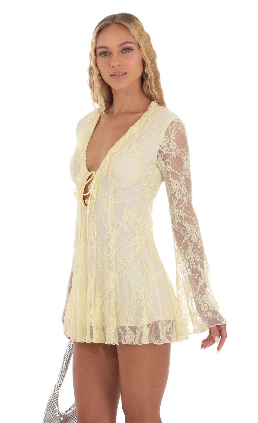 Picture Lace Plunge Neck Dress in Yellow. Source: https://media-img.lucyinthesky.com/data/Sep23/850xAUTO/7f6ab832-21cc-428c-84c3-e4a4a46fbd24.jpg