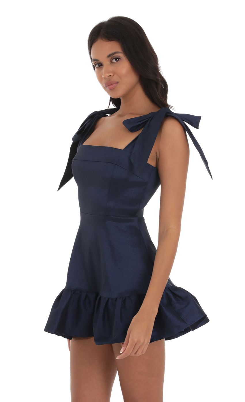 Picture Ruffle Square Neck Dress in Navy. Source: https://media-img.lucyinthesky.com/data/Sep23/850xAUTO/97385d95-ef02-4fa0-8c7e-40c286098198.jpg