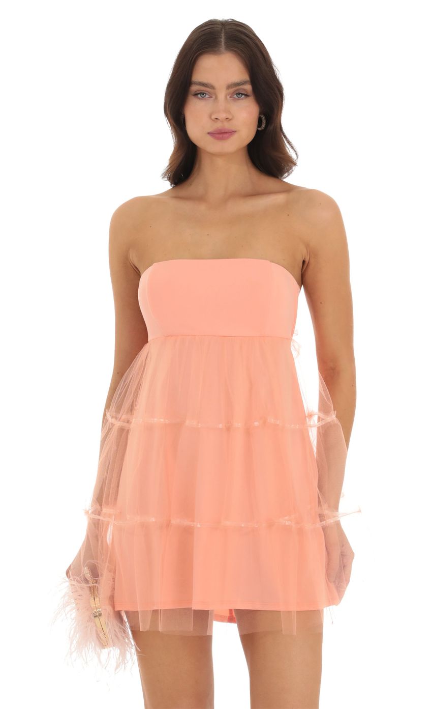Picture Tulle Strapless Babydoll Dress in Coral. Source: https://media-img.lucyinthesky.com/data/Sep23/850xAUTO/a9752a67-c218-4235-9170-a0f589e5e815.jpg