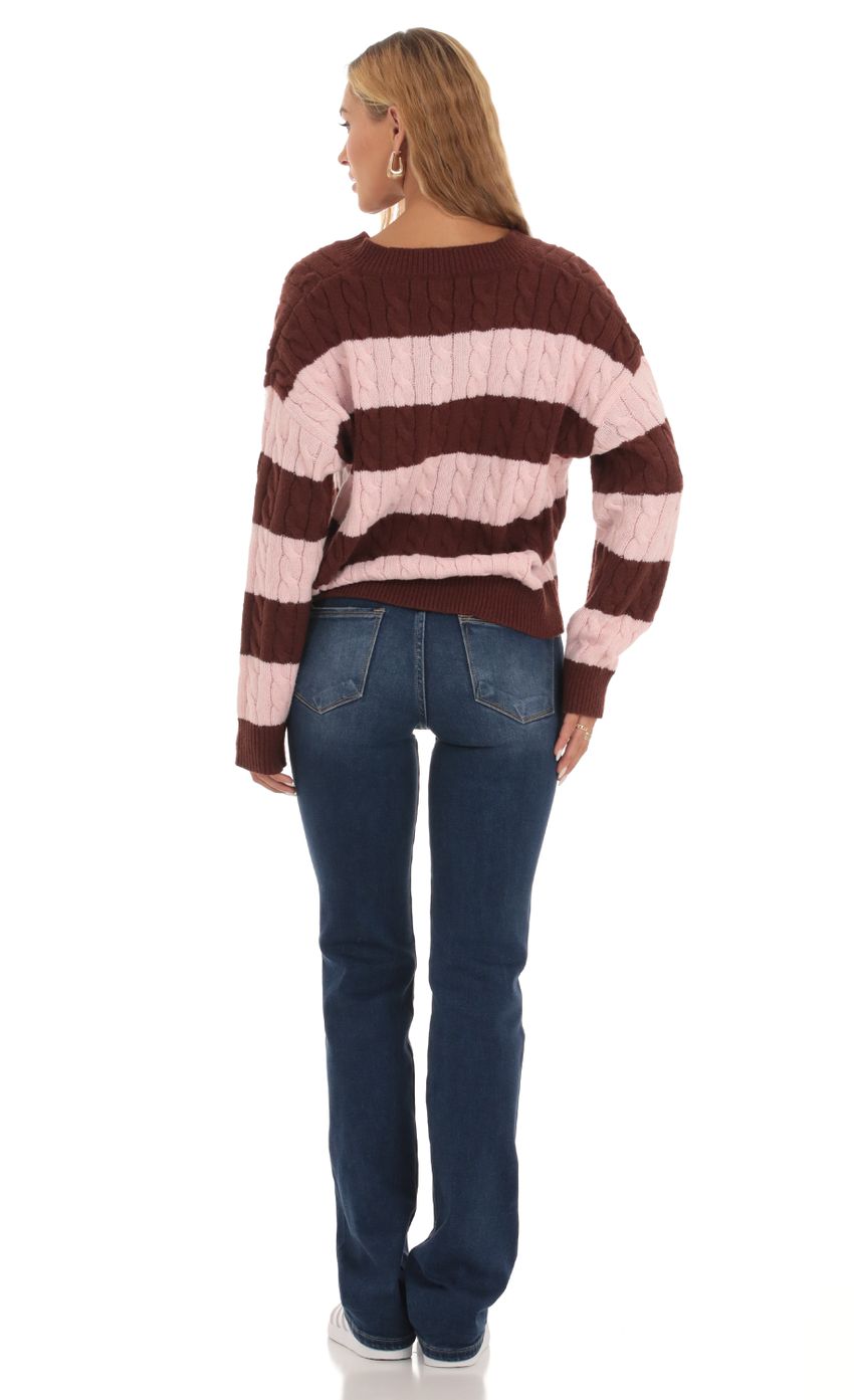 Picture Cable Knit Jumper in Pink and Brown. Source: https://media-img.lucyinthesky.com/data/Sep23/850xAUTO/b3b9d6fc-8be0-485d-ac86-cce3f9fc9cf7.jpg