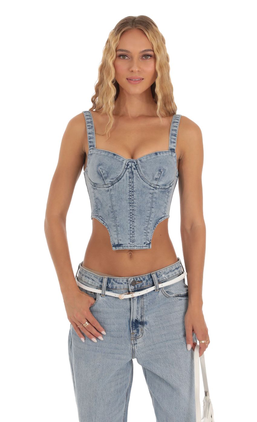 Picture Acid Wash Denim Top in Blue. Source: https://media-img.lucyinthesky.com/data/Sep23/850xAUTO/c976d772-0221-451a-83cf-b82731b95bfb.jpg