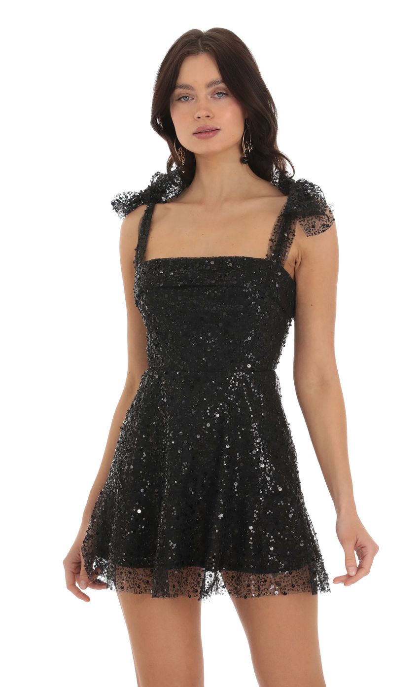 Picture Sequin Mini Dress in Black. Source: https://media-img.lucyinthesky.com/data/Sep23/850xAUTO/da1a0c9e-e836-4f18-a10a-bf6ab16278a7.jpg