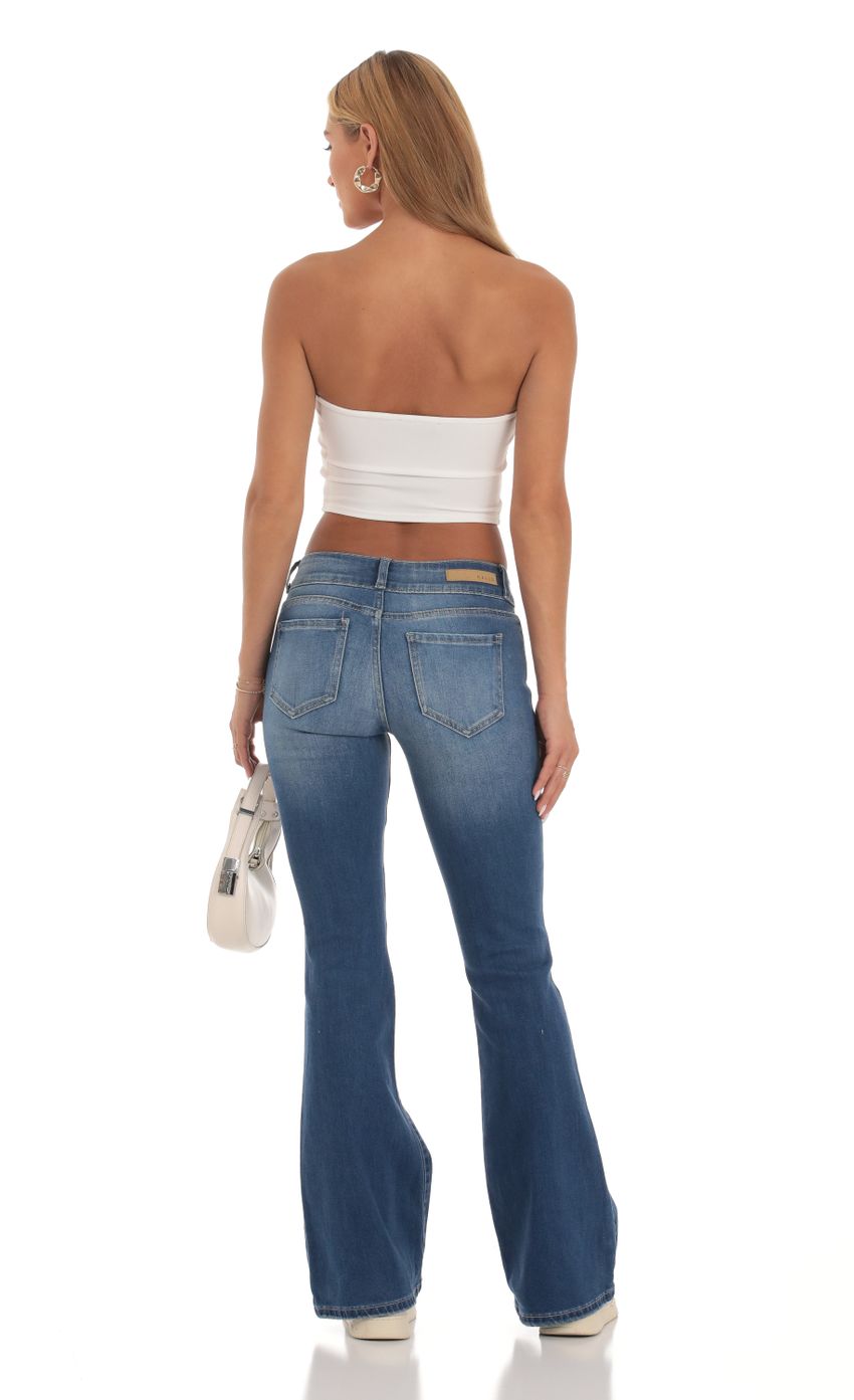 Picture Low Rise Flare Jeans in Light Denim. Source: https://media-img.lucyinthesky.com/data/Sep23/850xAUTO/dfff157e-6270-4385-8859-8d47a6de2cb4.jpg