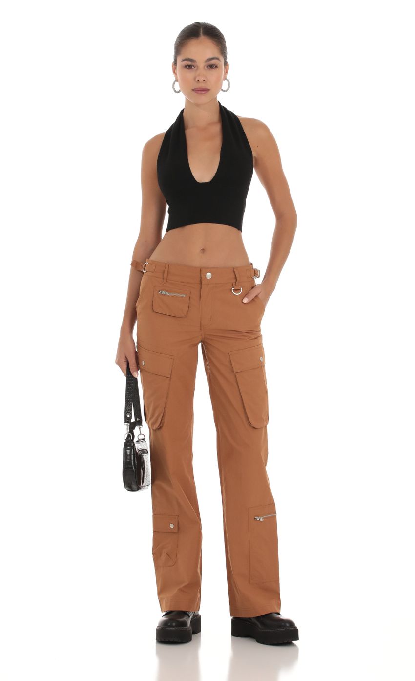 Picture Cargo Pants in Brown. Source: https://media-img.lucyinthesky.com/data/Sep23/850xAUTO/e14e11b3-0f30-4871-8f00-8b63629dd9d3.jpg