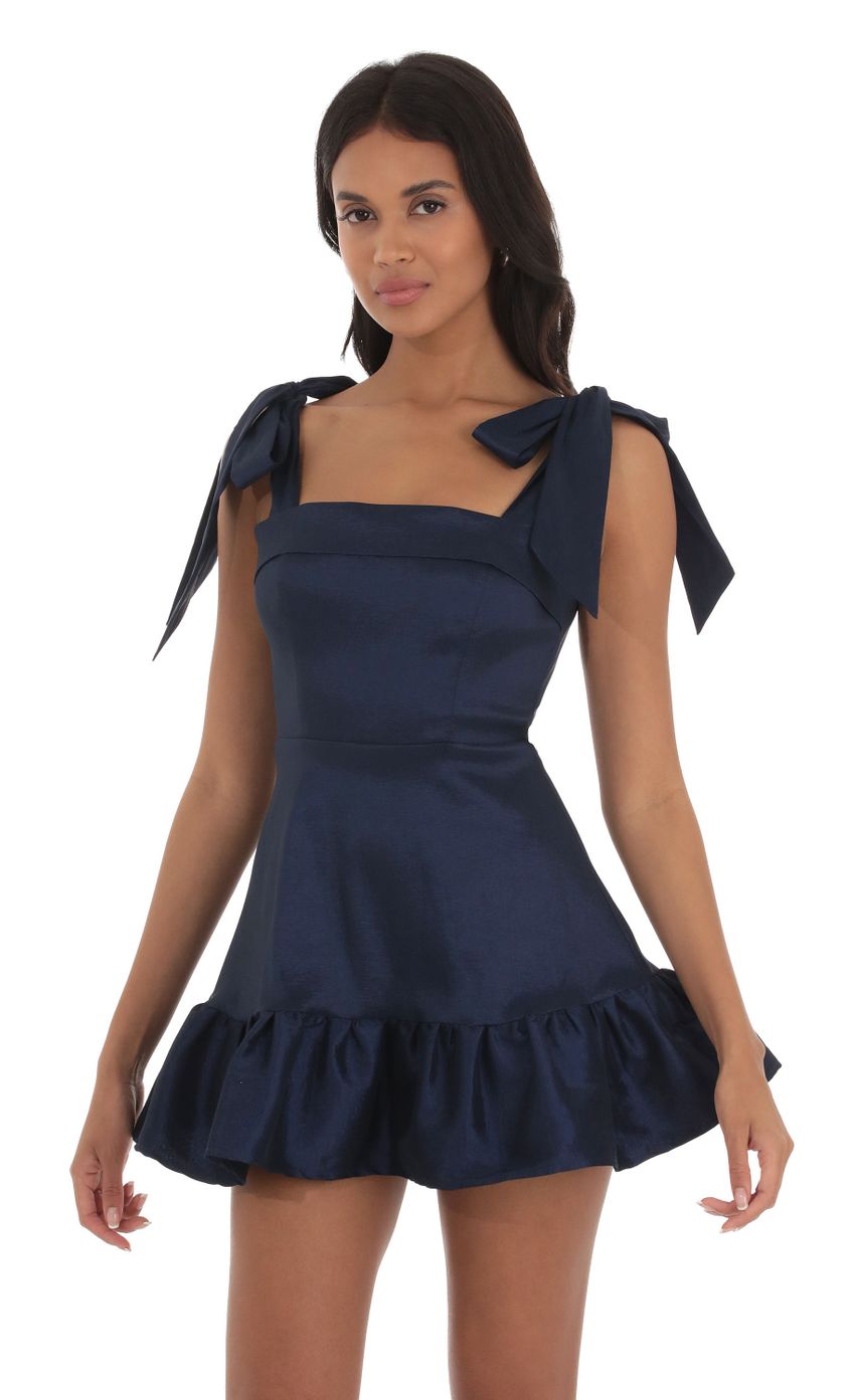 Picture Ruffle Square Neck Dress in Navy. Source: https://media-img.lucyinthesky.com/data/Sep23/850xAUTO/f5178401-659f-4eaf-9d97-83145e46d2b0.jpg