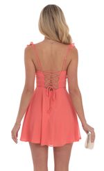 Picture Ruffle Strap A-Line Dress in Coral. Source: https://media-img.lucyinthesky.com/data/Sep24/150xAUTO/0f4a7e02-f67d-4c47-8af7-24fc89295467.jpg