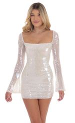 Picture Iridescent Sequin Long Sleeve Bodycon Dress in White. Source: https://media-img.lucyinthesky.com/data/Sep24/150xAUTO/5345975a-1774-44d6-89e6-a9fa8ff3bda3.jpg