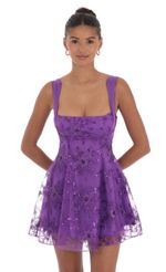 Picture Sequin Floral Fit and Flare Dress in Purple. Source: https://media-img.lucyinthesky.com/data/Sep24/150xAUTO/6bfba425-98ac-4d1f-8409-914947d2abff.jpg