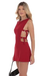 Picture Buckle Cutout Dress in Red. Source: https://media-img.lucyinthesky.com/data/Sep24/150xAUTO/e1a75ea7-b0d5-4846-ad80-91f1d23cb879.jpg