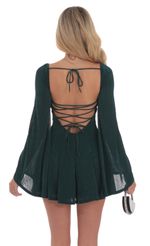 Picture Slinky Flare Sleeve Dress in Dark Green. Source: https://media-img.lucyinthesky.com/data/Sep24/150xAUTO/f39ea31d-c1c5-42a6-8f77-9d8728bcd264.jpg