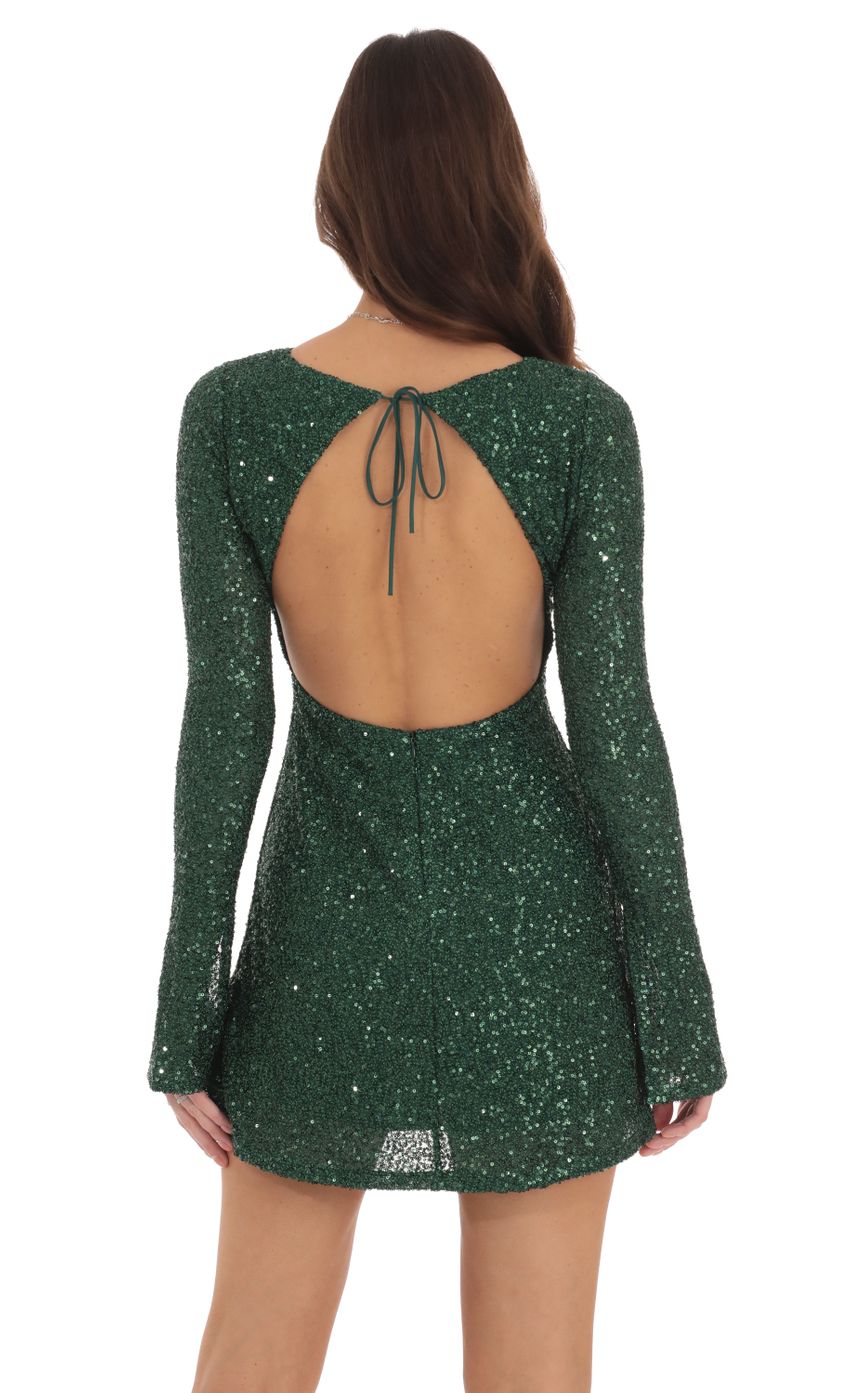 Picture Sequin Long Sleeve Open Back Dress in Green. Source: https://media-img.lucyinthesky.com/data/Sep24/850xAUTO/00e55a57-5fbe-434d-81f9-701b692a0471.jpg