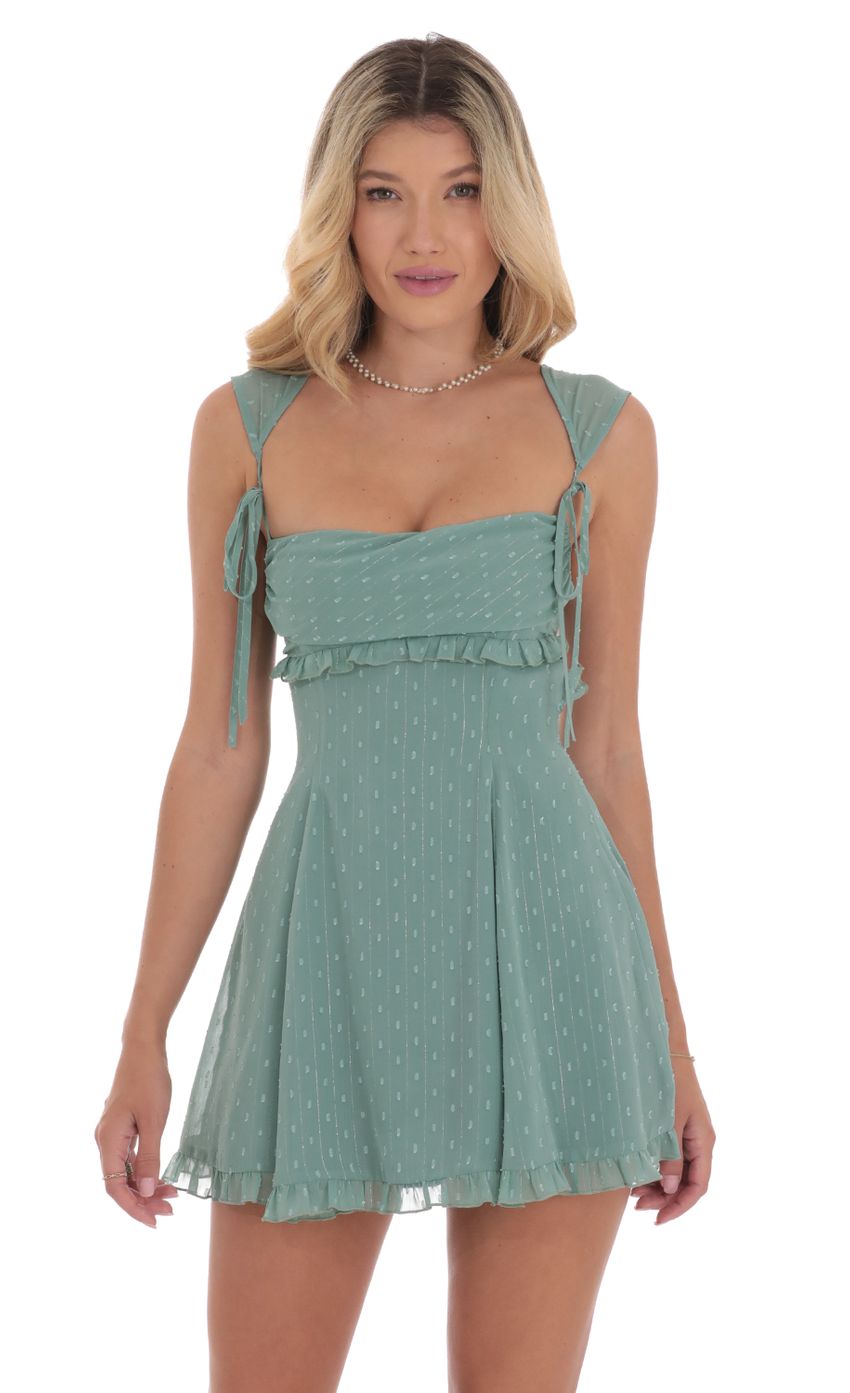 Picture Dotted Shimmer Cap Sleeve Dress in Sage. Source: https://media-img.lucyinthesky.com/data/Sep24/850xAUTO/03778c49-69f4-4dab-8911-3c0509559de6.jpg