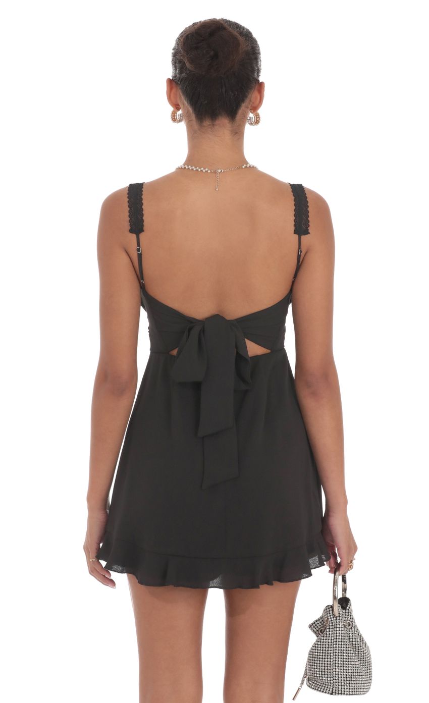 Picture Lace Strap Open Back Dress in Black. Source: https://media-img.lucyinthesky.com/data/Sep24/850xAUTO/047bbfb9-5cc5-4380-aca3-7c7294acad79.jpg