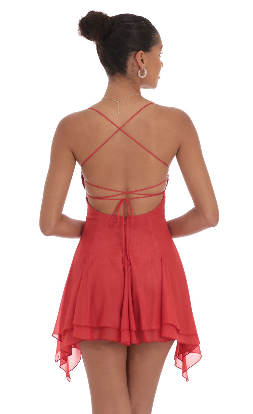 Picture Shimmer Asymmetrical Side Flare Dress in Red. Source: https://media-img.lucyinthesky.com/data/Sep24/850xAUTO/058d6918-991e-4e42-9859-747559c07c8e.jpg