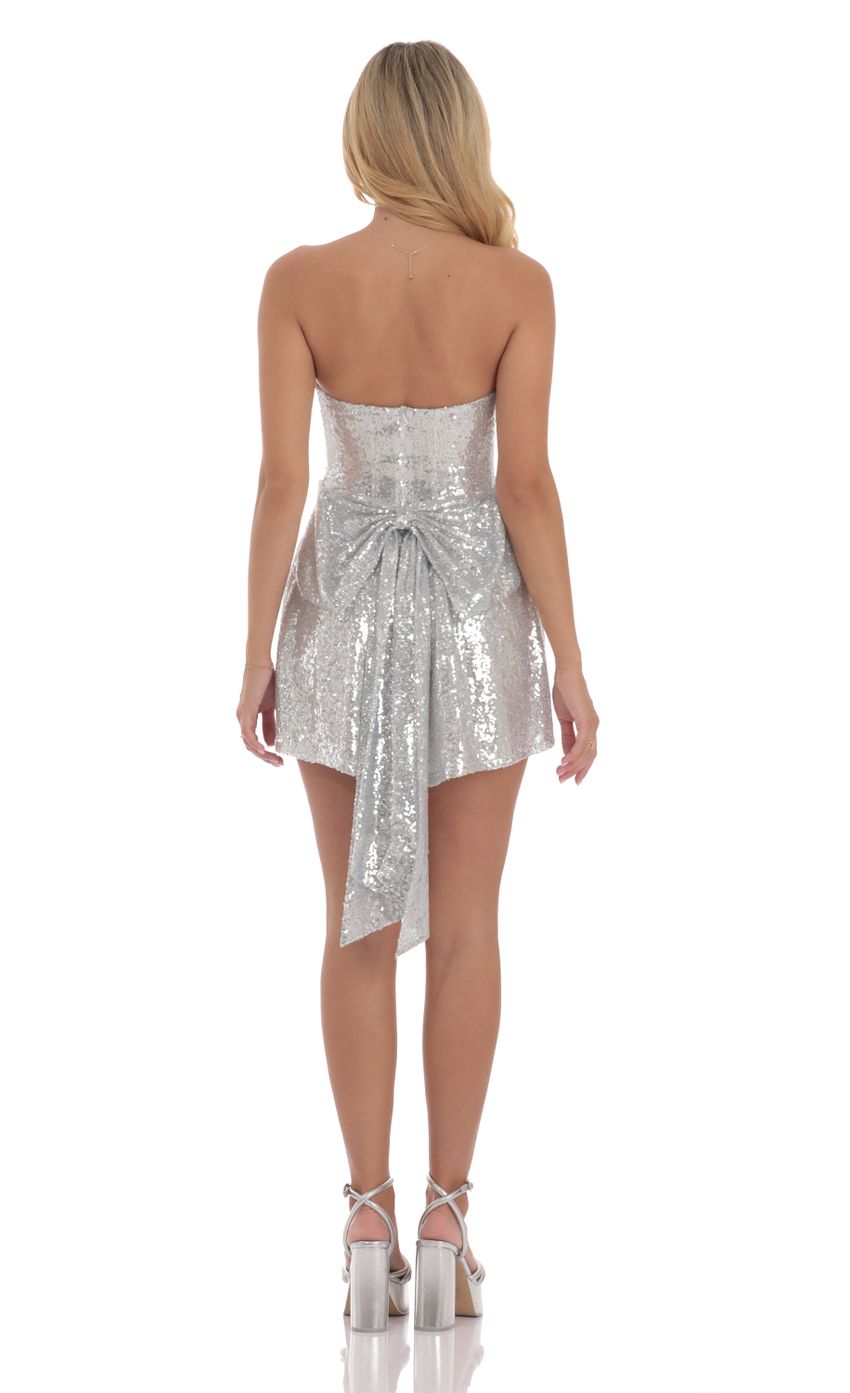 Picture Sequin Attachable Bow Dress in Silver. Source: https://media-img.lucyinthesky.com/data/Sep24/850xAUTO/072f774b-5f53-45fa-9854-9ad5d6e42aed.jpg