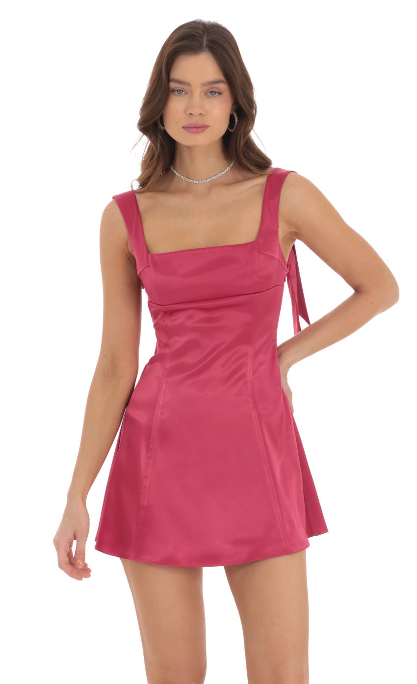 Picture Back Bows Dress in Magenta. Source: https://media-img.lucyinthesky.com/data/Sep24/850xAUTO/151de544-be8d-4c01-9eae-dd909e414cf1.jpg