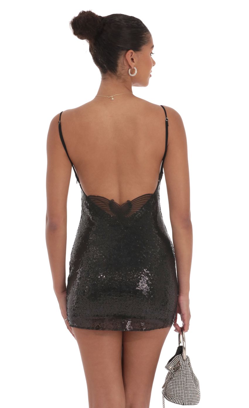 Picture Sequin Butterfly Dress in Black. Source: https://media-img.lucyinthesky.com/data/Sep24/850xAUTO/1c214820-c8ee-43f0-9902-b9d694272a90.jpg