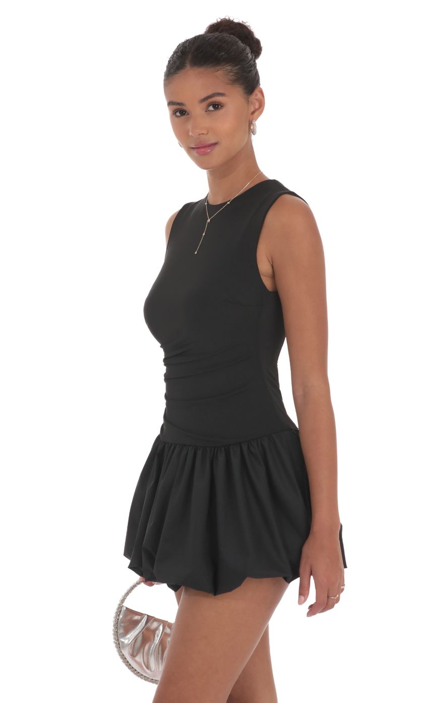 Picture High Neck Bubble Dress in Black. Source: https://media-img.lucyinthesky.com/data/Sep24/850xAUTO/1f0224ec-845b-4cec-b463-c7552405fb9e.jpg