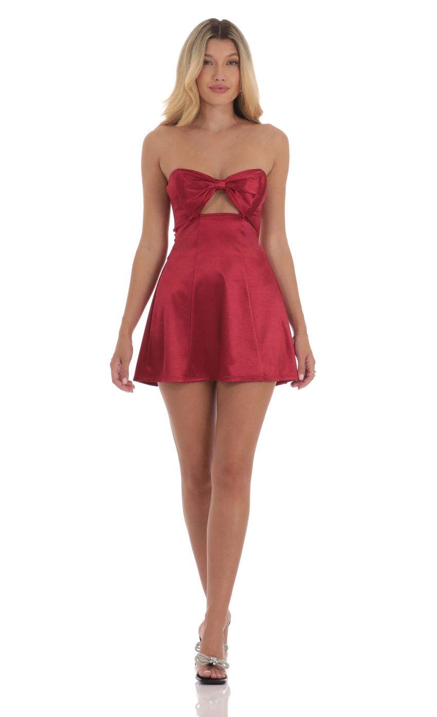 Picture Satin Bow Cutout Strapless Dress in Red. Source: https://media-img.lucyinthesky.com/data/Sep24/850xAUTO/203fb211-a410-48bc-ae7c-e0eda1fd4c67.jpg