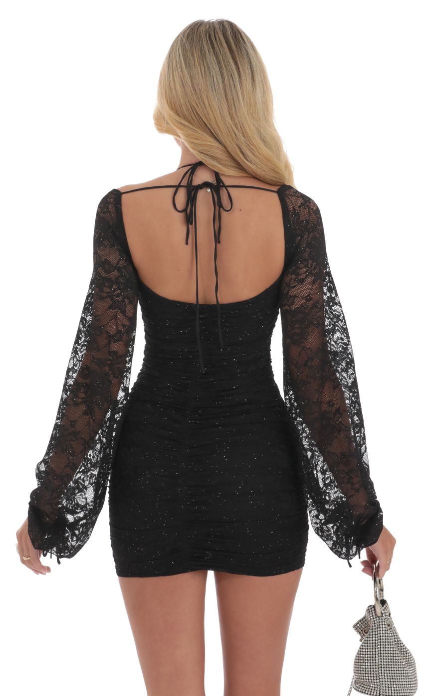 Picture Shimmer Lace Ruched Long Sleeve Dress in Black. Source: https://media-img.lucyinthesky.com/data/Sep24/850xAUTO/25c8895d-6673-4be2-bc59-2378e11d5091.jpg