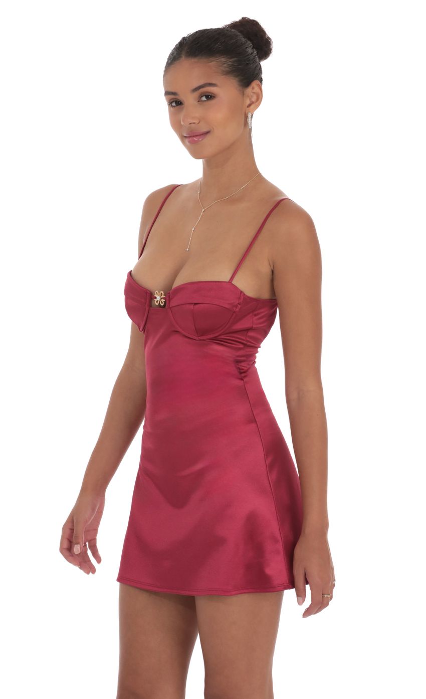 Picture Satin Front Hook Dress in Maroon. Source: https://media-img.lucyinthesky.com/data/Sep24/850xAUTO/3c62fb1b-4b78-433f-a5ef-b25d87b1c1fe.jpg