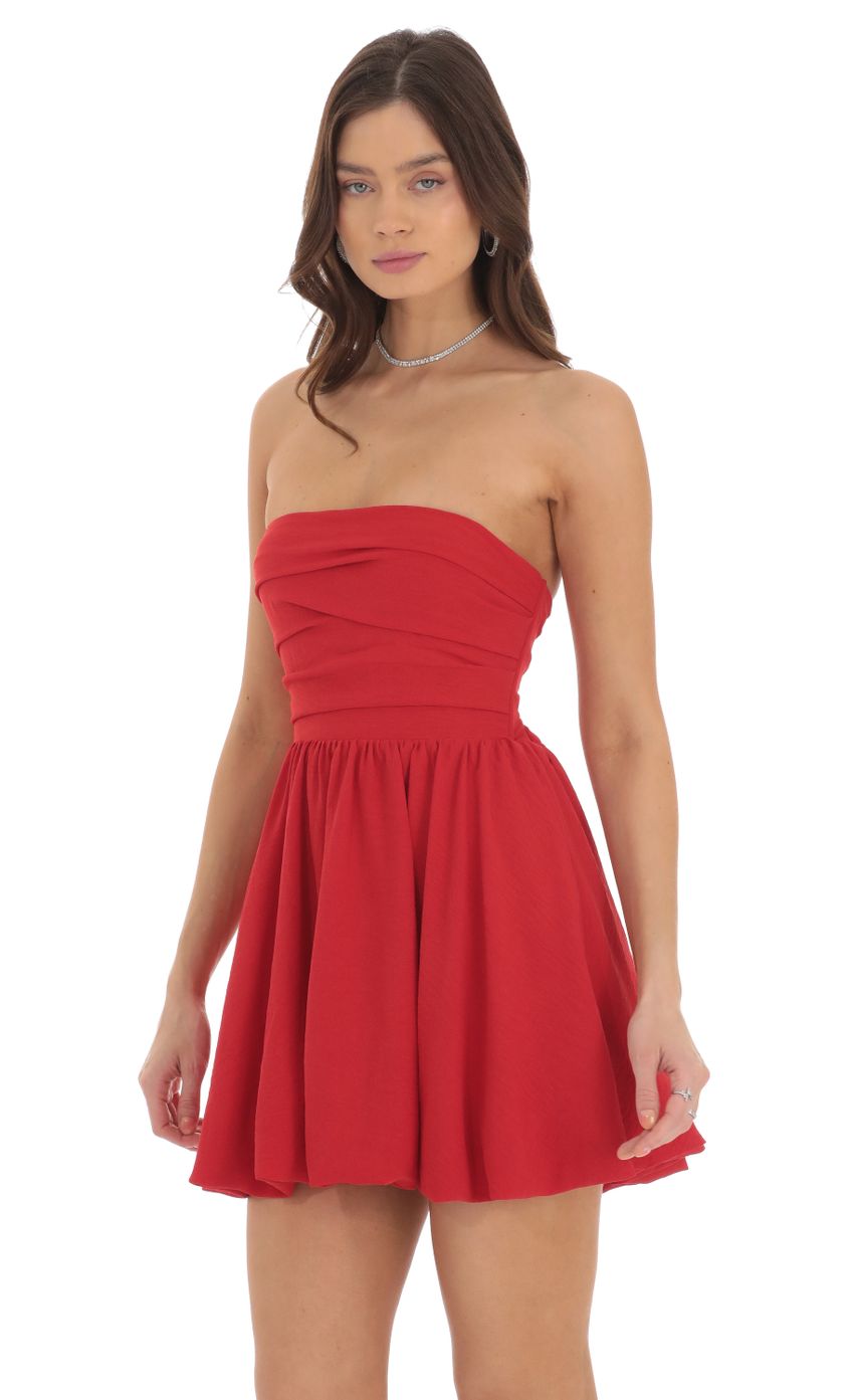 Picture Strapless Bubble Dress in Red. Source: https://media-img.lucyinthesky.com/data/Sep24/850xAUTO/40dfda36-5a21-4558-9c32-8a842869b6c1.jpg