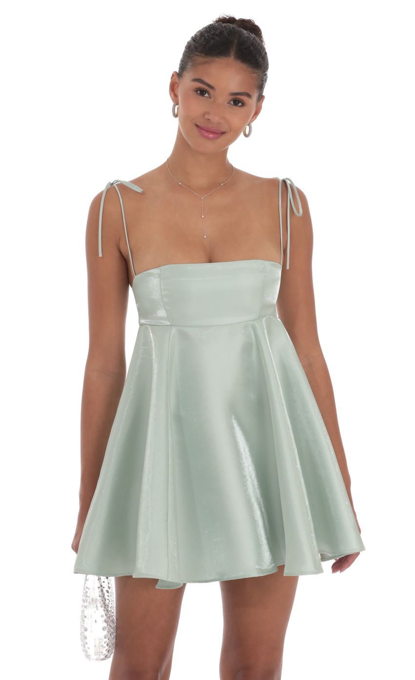 Picture Sheen Flare Babydoll Dress in Sage Green. Source: https://media-img.lucyinthesky.com/data/Sep24/850xAUTO/4c1f6911-6032-4c5a-b2cd-8424c29300ab.jpg