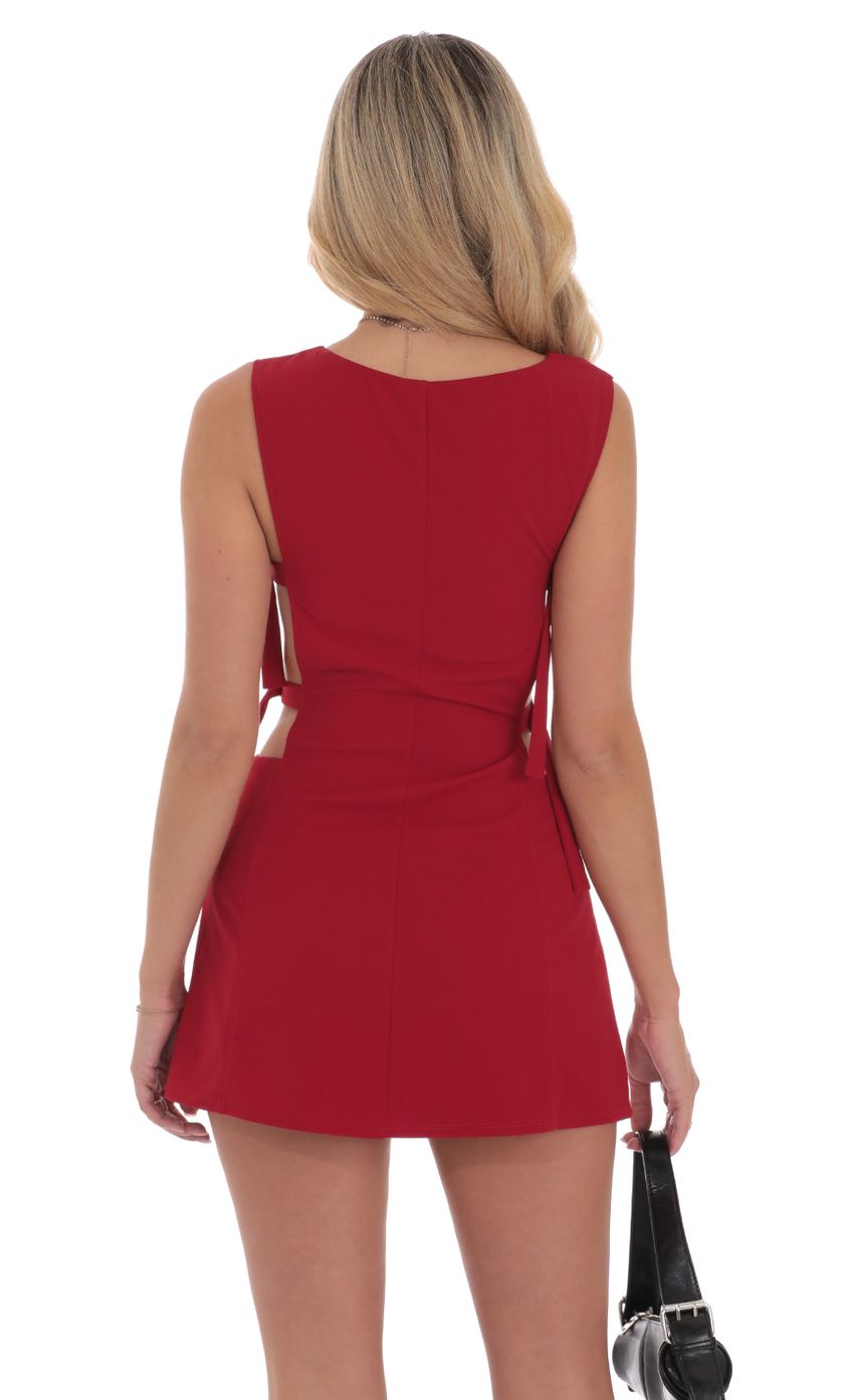 Picture Buckle Cutout Dress in Red. Source: https://media-img.lucyinthesky.com/data/Sep24/850xAUTO/61e7b3c2-83ba-4fba-8c84-22e53ebad420.jpg