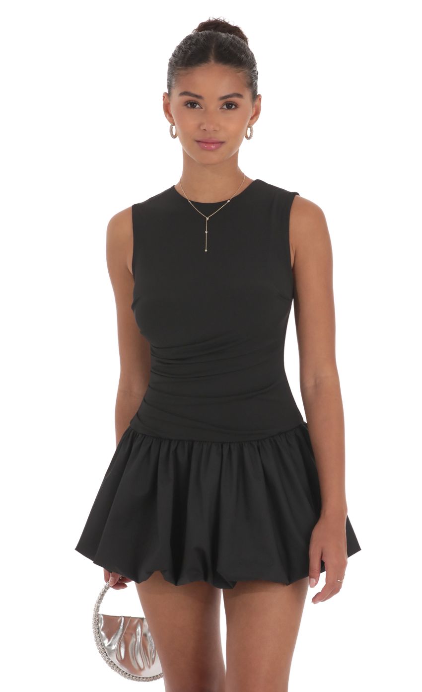 Picture High Neck Bubble Dress in Black. Source: https://media-img.lucyinthesky.com/data/Sep24/850xAUTO/79c7308e-cf9b-487d-9783-8fb45f8ea60d.jpg