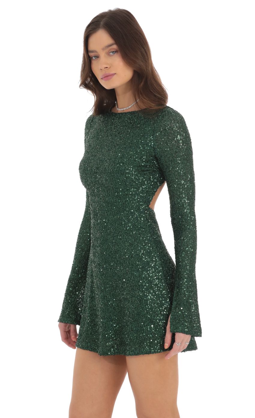 Picture Sequin Long Sleeve Open Back Dress in Green. Source: https://media-img.lucyinthesky.com/data/Sep24/850xAUTO/80bd3996-d1a5-4882-8a81-4882ce246b78.jpg