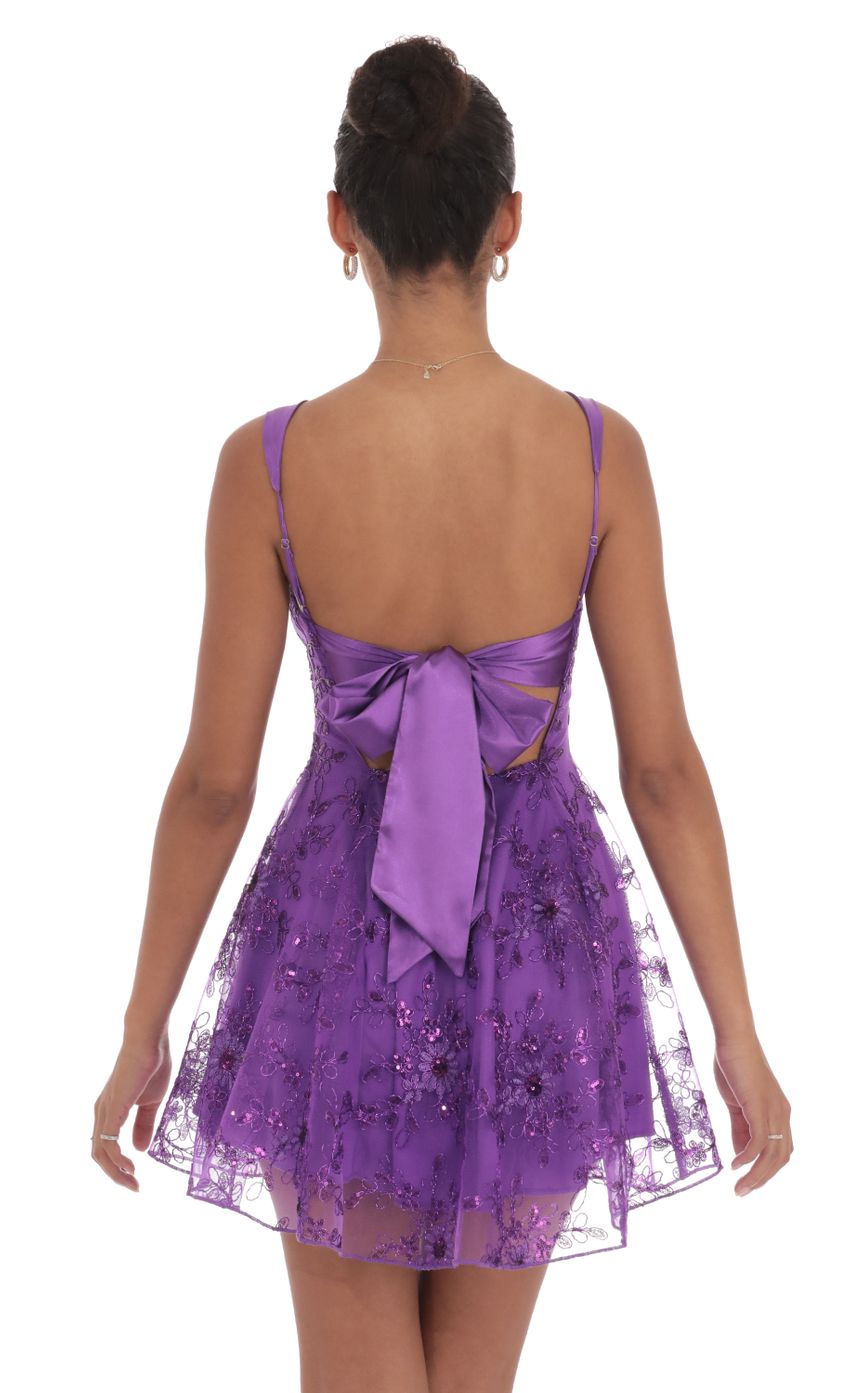 Picture Sequin Floral Fit and Flare Dress in Purple. Source: https://media-img.lucyinthesky.com/data/Sep24/850xAUTO/8e037990-6a1a-46cb-bb5c-307f4cb7ed34.jpg