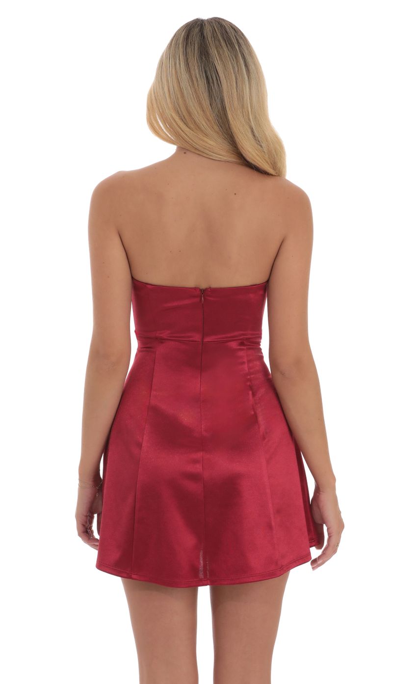 Picture Satin Bow Cutout Strapless Dress in Red. Source: https://media-img.lucyinthesky.com/data/Sep24/850xAUTO/9ffc1814-3995-4f91-8c0e-252443e2d533.jpg