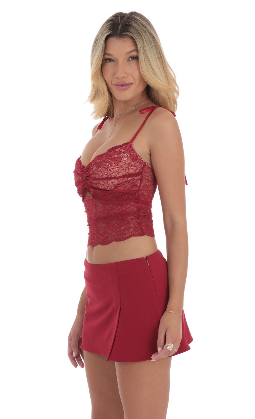 Picture Lace Cutout Top in Red. Source: https://media-img.lucyinthesky.com/data/Sep24/850xAUTO/a0b0d7f8-f175-48dc-b211-213a62e60f8e.jpg