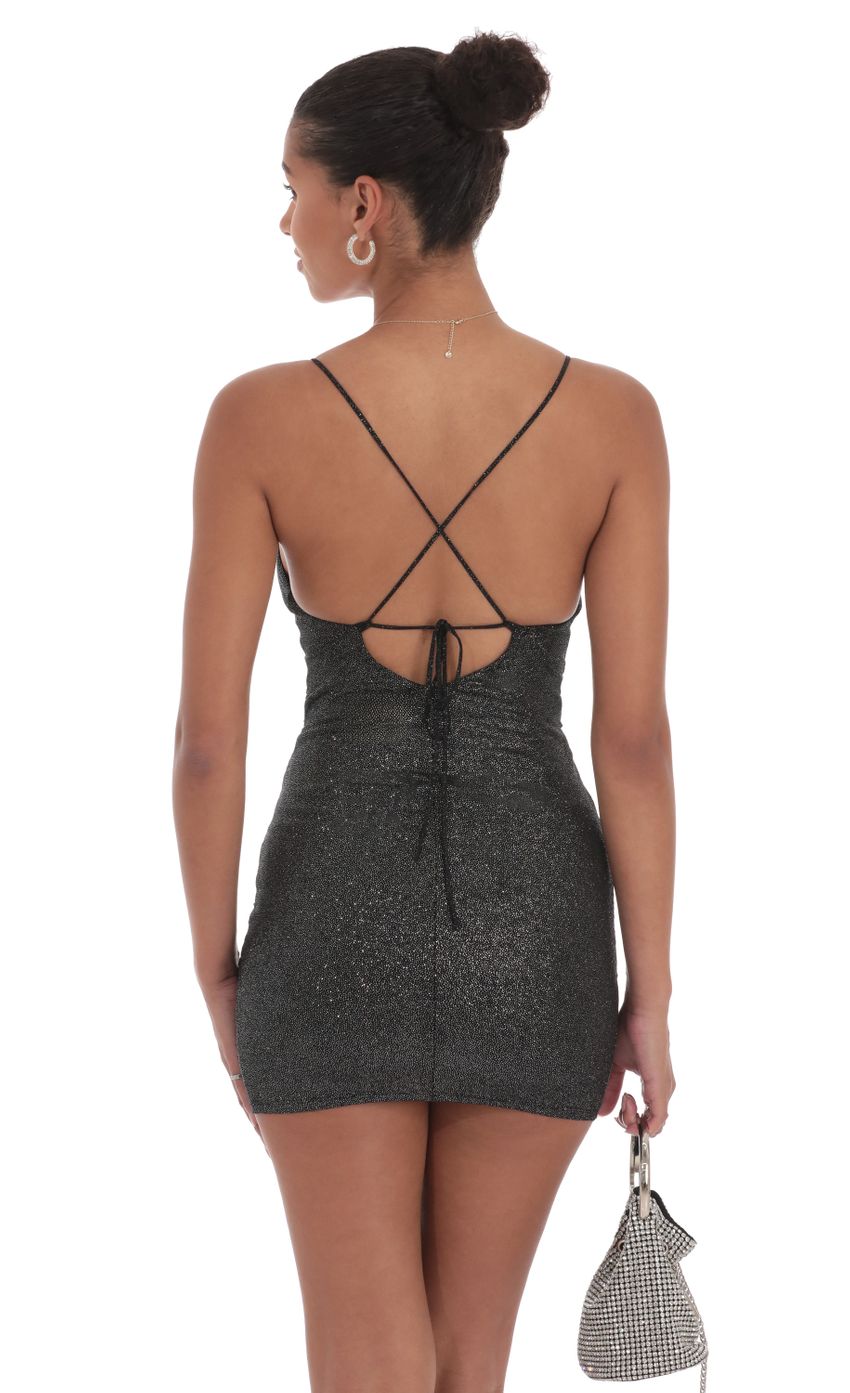 Picture Shimmer Ruched Cross-Back Dress in Black. Source: https://media-img.lucyinthesky.com/data/Sep24/850xAUTO/a23e1cb3-4798-4577-bebc-b833a95a862d.jpg