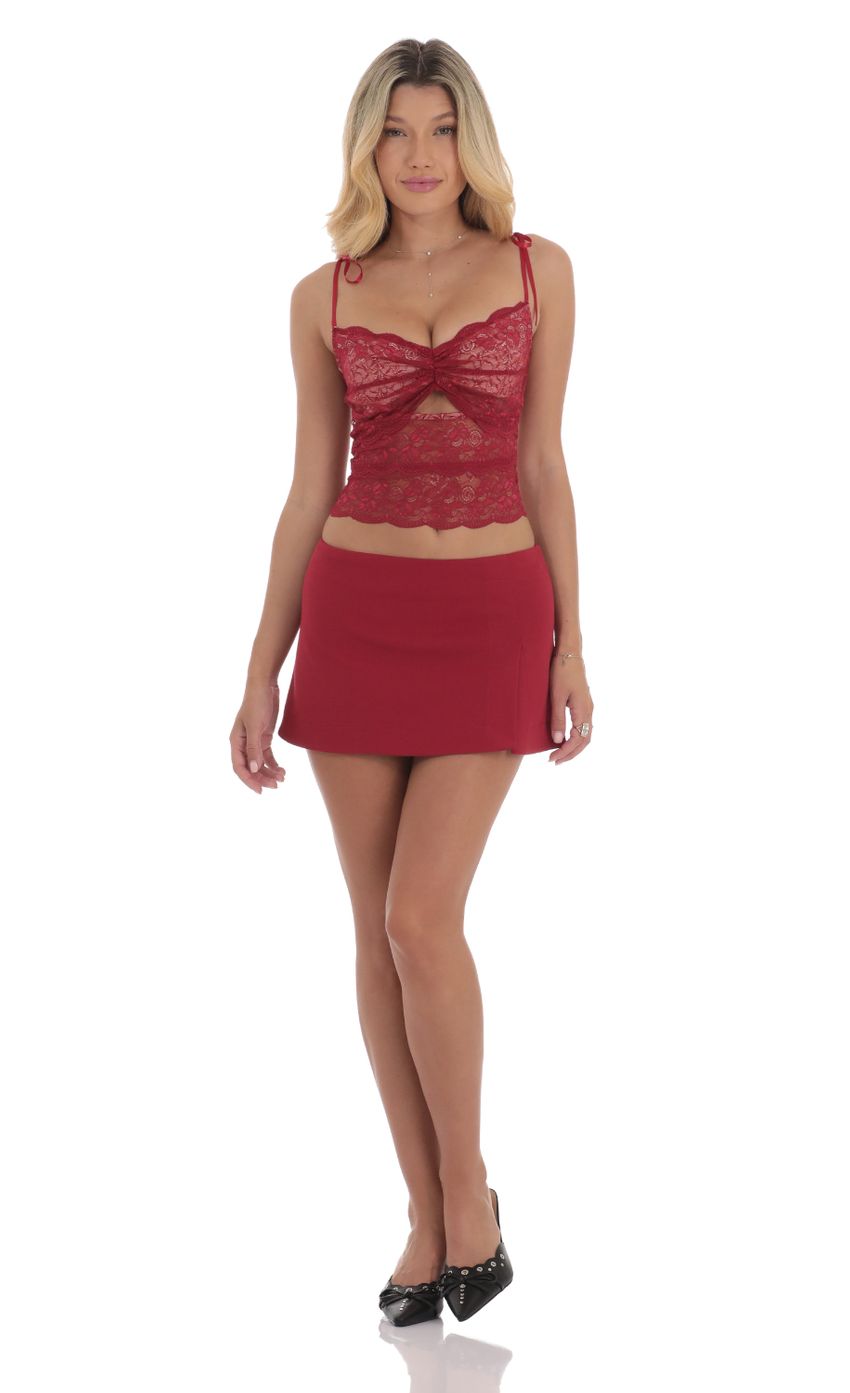 Picture Lace Cutout Top in Red. Source: https://media-img.lucyinthesky.com/data/Sep24/850xAUTO/a34beb50-f233-4b3c-acda-6851f83be98f.jpg