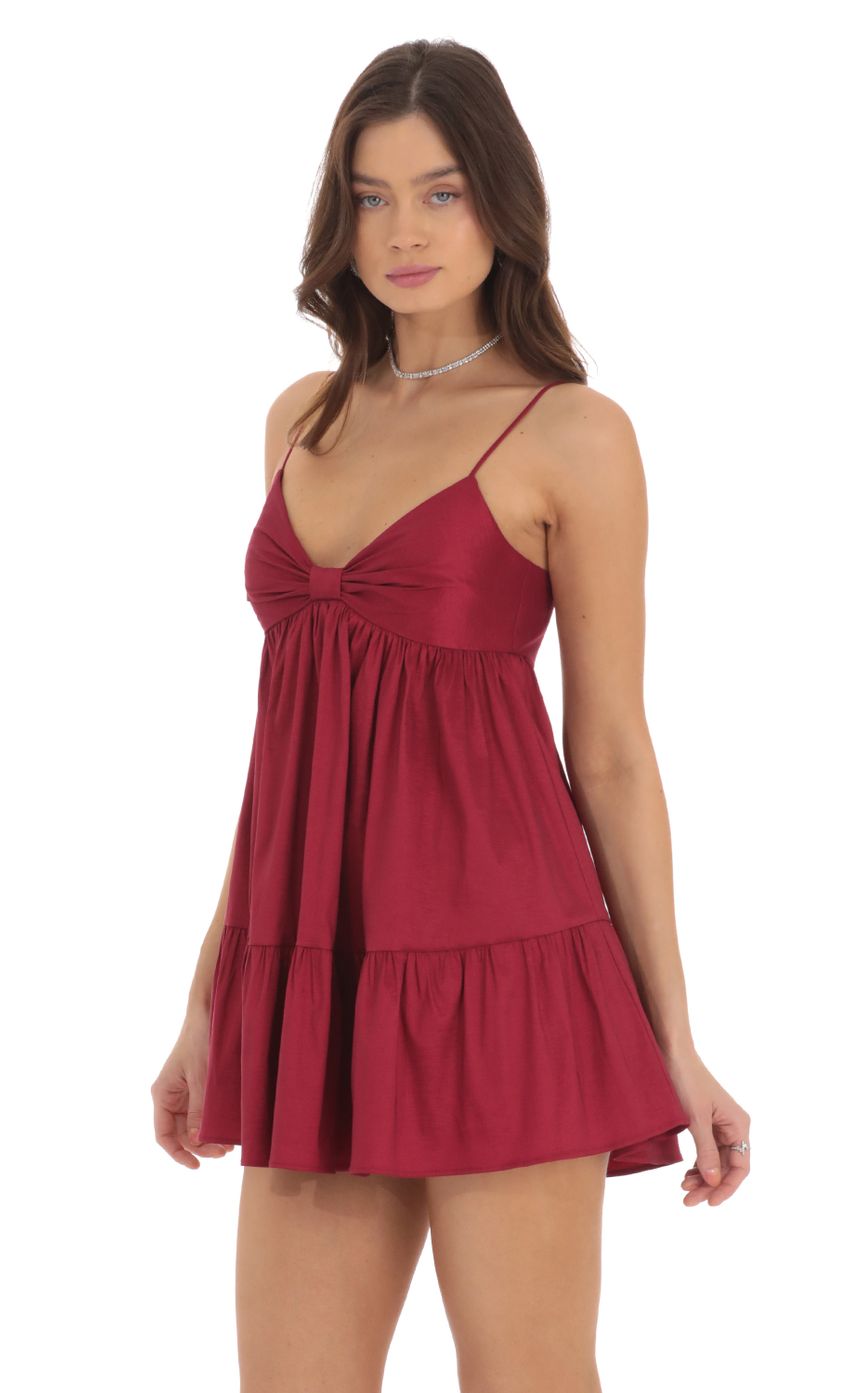 Picture Bow Babydoll Dress in Maroon. Source: https://media-img.lucyinthesky.com/data/Sep24/850xAUTO/a3da142b-0b2b-4663-a0c6-1fc7958081d2.jpg