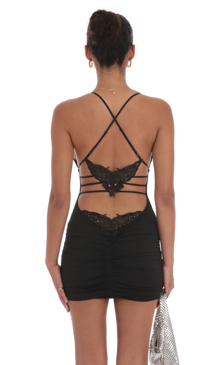 Picture Strappy Butterfly Bodycon Dress in Black. Source: https://media-img.lucyinthesky.com/data/Sep24/850xAUTO/aa6d2414-499f-4a8a-ab23-d51bf98910f3.jpg