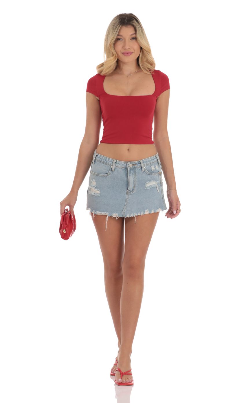 Picture Short Sleeve Crop Top in Red. Source: https://media-img.lucyinthesky.com/data/Sep24/850xAUTO/c3981f13-6fe6-4704-b9f7-3344b0db0d35.jpg