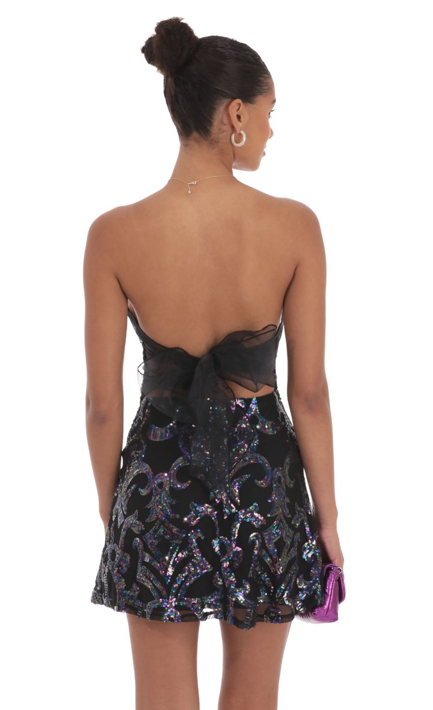 Picture Sequin Mesh Strapless Dress in Black. Source: https://media-img.lucyinthesky.com/data/Sep24/850xAUTO/d016bfd9-61af-43da-9f3a-820f95305d56.jpg