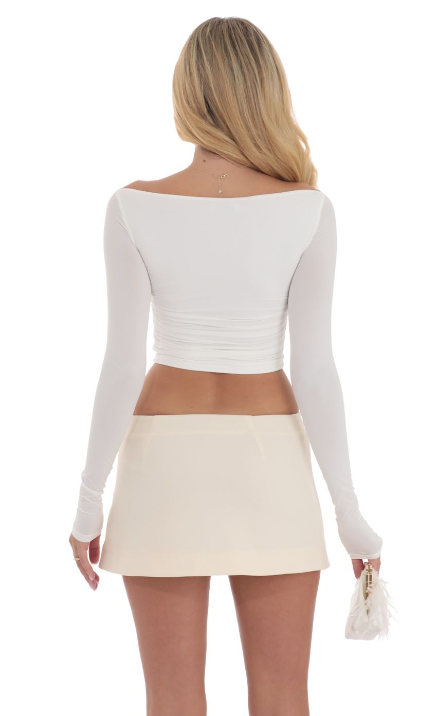 Picture Long Sleeve Ruched Top in White. Source: https://media-img.lucyinthesky.com/data/Sep24/850xAUTO/d086a610-d40d-4268-a997-6f2b1e8e386b.jpg