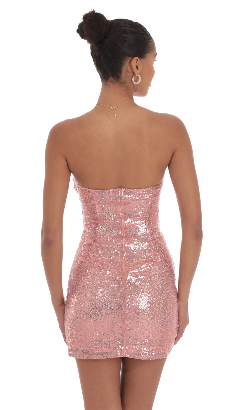 Picture Sequin Strapless Cutout Dress in Rose. Source: https://media-img.lucyinthesky.com/data/Sep24/850xAUTO/da6c81e6-a001-441d-bfde-6557ab4fc6f1.jpg